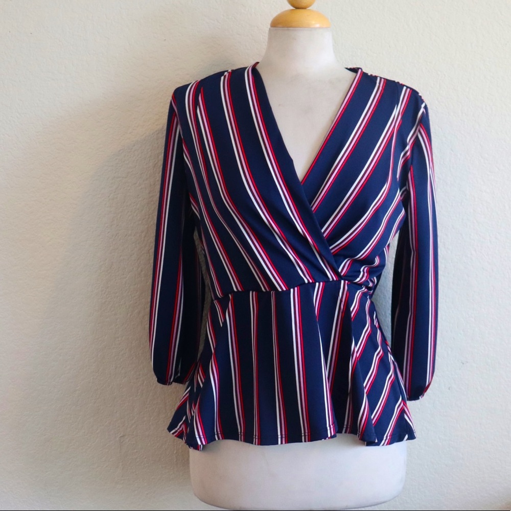 Peplum surpliced neck blouse